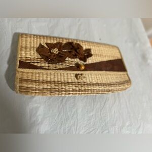 Woven Straw Clutch with Floral Accent